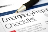 Image: Pen and Clipboard, paper on clipboard reads "Emergency Preparedness Checklist"